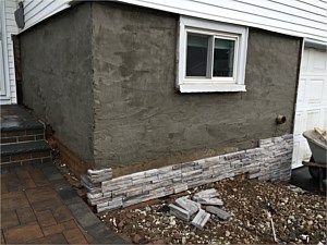 split level remove brick install culture stone faststak gray stone